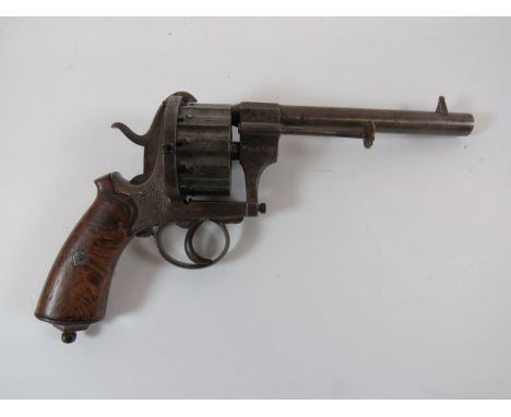 Rare Belgian 12 Shot Pinfire Revolver9 mm pinfire, 6 inch barrel. Right side clearing rod. Large fluted cylinder with floral 