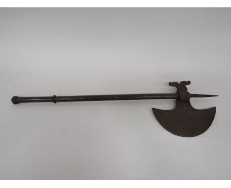 Early 19th Century Indian Axesteel, single edged crescent head with central block and rear scroll mount.  Top square section 