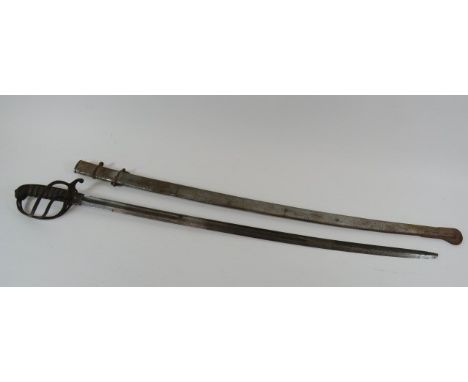 Victorian Royal Artillery Officer's Sword33 3/4 inch, single edged, slightly curved blade with large fuller.  Etched foliage 