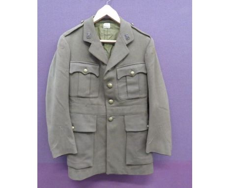 WW1 Post 1917 North Stafford Officer's Tunickhaki, single breasted, open collar tunic.  The collar with bronzed North Staffor