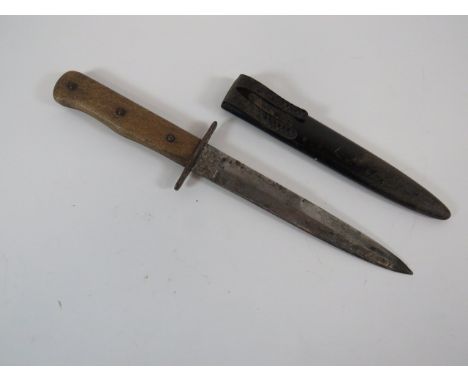 WW2 German Trench Boot Knife6 1/2 inch, single edged blade with sharpened back edge point.  Forte with various stamps.  Steel