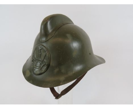 Unusual Russian Fire Brigade Steel Helmetgreen painted crown with large downswept rear brim and small peak.  Top comb.  Press