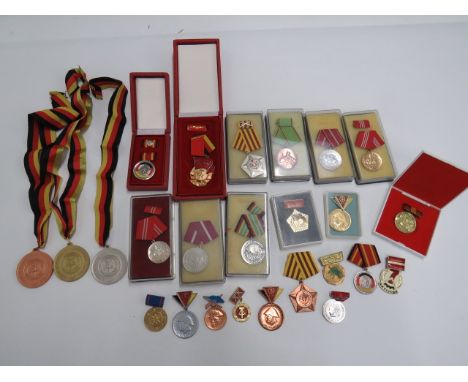 Good Selection of East German Medalsincluding gold, silver and bronze sports medals ... 2 x various orders ... 10 x boxed med