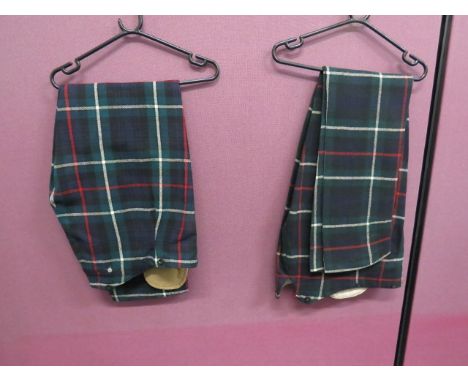 Two Pairs of Highland Light Infantry Trewstartan trews with hidden hip ticket pocket.  Part waist lining.  Clean condition.  