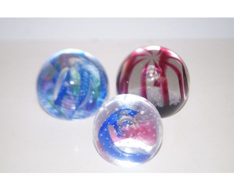 3 Signed Caithness paperweights