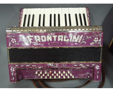 Frontalini Italia piano accordion with diamante and floral finish with hard case This lot must be paid for and removed no lat