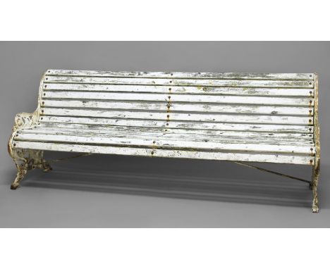 VICTORIAN STYLE BENCH, the cast iron end with scrolling foliage joined by wooden slats, white painted, length 214cm