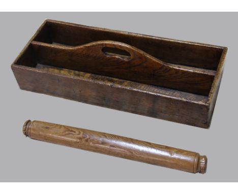 ASH CHURCH WARDEN CLAY PIPE TRAY, 19th century, with a central handle, length 51cm; and a yew wood rolling pin (2)