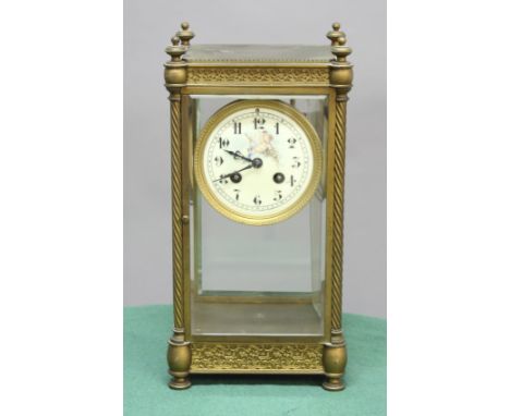 FRENCH FOUR PANE MANTEL CLOCK, late 19th century, the 3 1/2" dial painted with a cherub, on a brass movement with a mercury p