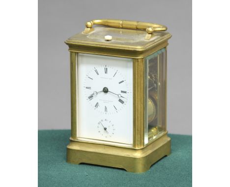 FRENCH GILT BRASS FOUR PANE CARRIAGE CLOCK, the enamelled dial with subsidiary alarm dial and inscribed Bourdin Bte/ Rue de l