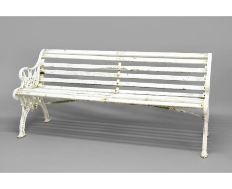 COAKBROOKDALE STYLE GARDEN BENCH, the cast iron ends with convolvulus and thistle leaves, joined by wooden slats, white paint