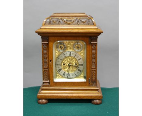 OAK CASED MANTEL CLOCK, the 4 1/2" silvered chapter ring, strike silent and slow fast dials on a gilt dial, on an eight day, 