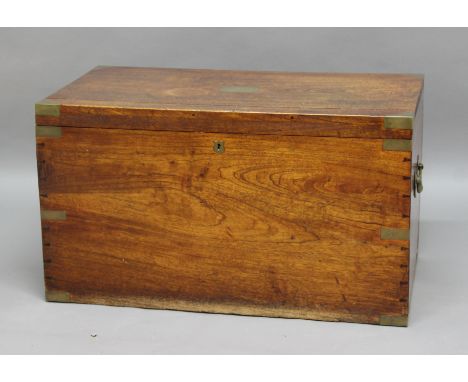 VICTORIAN CAMPHOR WOOD  AND BRASS MOUNTED CAMPAIGN STYLE TRUNK, the cover with a brass plaque inscribed Lionel de Sausmarez, 