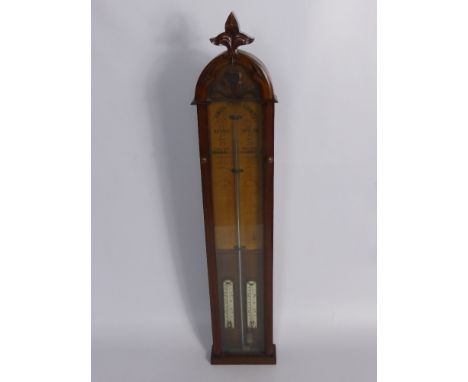 A 19th Century Admiral Fitzroy Barometer, pale oak Gothic cased, full length glazed front with a printed paper interior with 