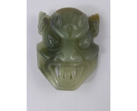 A Chinese Jade Hard Stone Mask Belt Buckle.