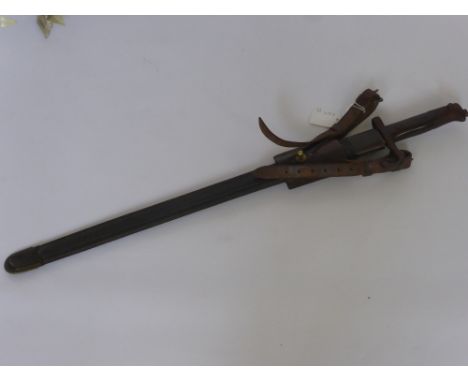A WW1 Model 1871 Bayonet, Italy Torre Annunziata Bayonet stamped UY24, one side of the blade stamped 'BL', leather scabbard a