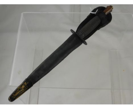 A Vintage Fairburn Sykes Fighting Knife, marked Sheffield to the hilt, in the original scabbard.