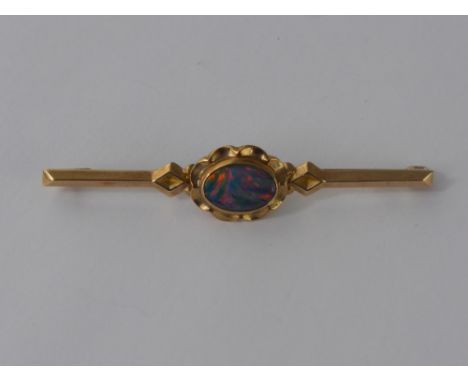 A Lady's Edwardian 9 ct Gold and Opal Stick Pin, together with 9 ct gold and pearl stock pin. (2)