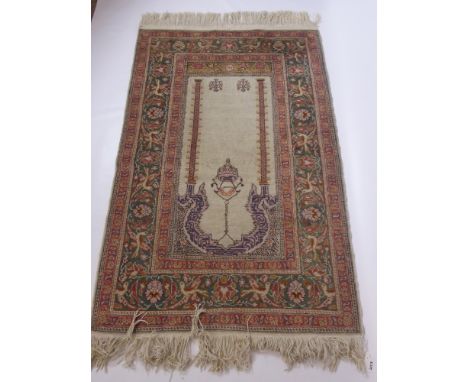 A Fine Wool Persian Prayer Rug, the rug having temple design to cream centre panel with bird to inner border, approx 135 x 86