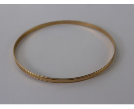 A Lady's 9 ct Gold Bangle, approx 4.4 gms. 