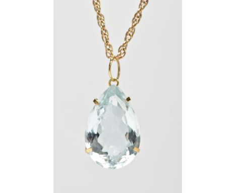 A 9CT GOLD AQUAMARINE PENDANT, a light blue-green pear cut large aquamarine stone, approximate total carat weight 20ct, appro