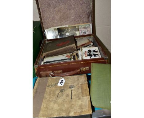 A SUITCASE OF POSTCARDS AND EARLY TWENTIETH CENTURY PHOTOGRAPHS, approximately one hundred and fifty postcards most from the 