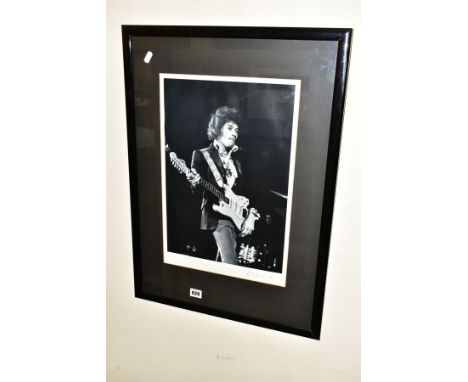 JIMI HENDRIX, three Jimi Hendrix images, a Val Wilmer photo-lithograph limited edition 68/500 of Jimi at the Royal Albert Hal