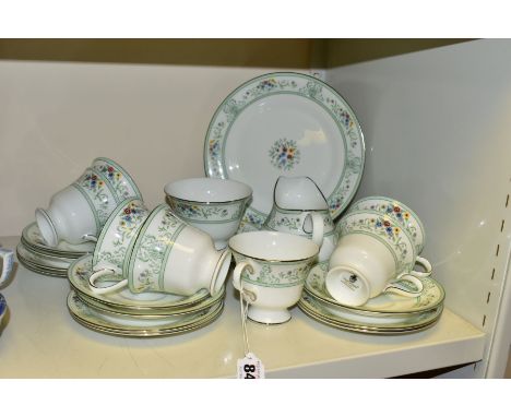 A TWENTY THREE PIECE WEDGWOOD AGINCOURT TEA SET, R4471, comprising  a cake plate, a cream jug, a sugar bowl, seven tea cups, 