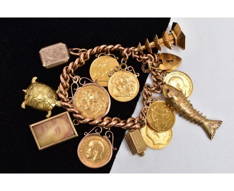 A HEAVY 9CT GOLD CHARM BRACELET WITH CHARMS AND SOVEREIGNS, curb link chain each link stamped 9.375, fitted with a heart clas