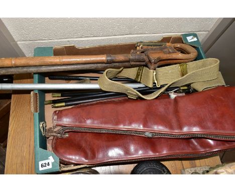 A BOX OF SHOOTING RELATED ITEMS, to include three hardwood two part gun cleaning rods with fittings, three shooting sticks of