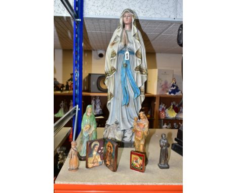 A GROUP OF CHRISTIAN RELIGIOUS STATUES AND ICONS, to include a carved wooden statue of Our Lady of Lourdes height 62cm, a bro