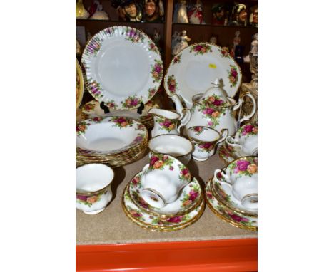 A THIRTY FOUR PIECE ROYAL ALBERT OLD COUNTRY ROSES DINNER SERVICE, comprising a teapot, a sugar bowl, a cream jug, a cake pla