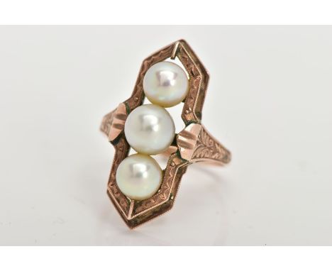 A YELLOW METAL CULTURED PEARL RING, mounted with three slightly graduated cultured pearls, within a textured surround and ope