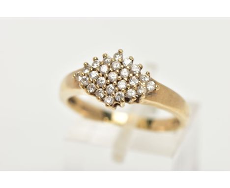 A 9CT GOLD CUBIC ZIRCONIA RING, of a lozenge shape set with a cluster of colourless cubic zirconia stones, to a plain polishe