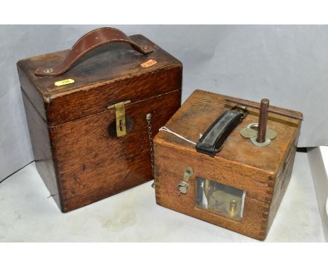 TWO MID 20TH CENTURY OAK CASED PIGEON CLOCKS, comprising a German EASYWAY, number 104377, with key and a Toulet Imperator fit