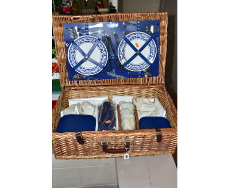 A BROOKES BASKETS WICKER PICNIC HAMPER FOR FOUR PLACE SETTINGS, comprising four Churchill pottery plates and mugs, four glass