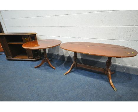 A MAHOGANY OVAL PEDESTAL COFFEE TABLE, width 116cm x depth 60cm x height 55cm with a similar circular occasional table labell