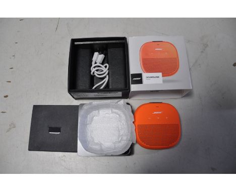A BOSE SOUNDLINK MICRO waterproof speaker (in new but used condition) (untested)