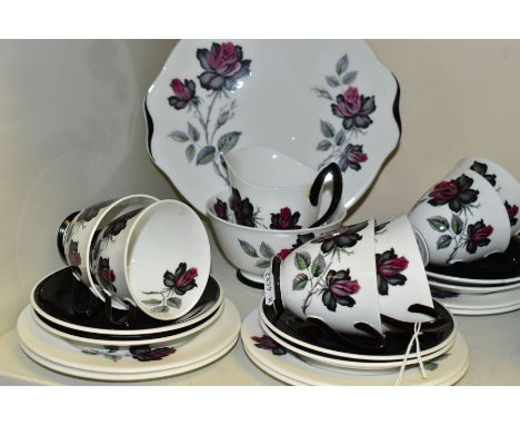 A TWENTY ONE PIECE ROYAL ALBERT MASQUERADE TEA SET, comprising a cake plate, a cream jug, a sugar bowl, six tea cups, six sau