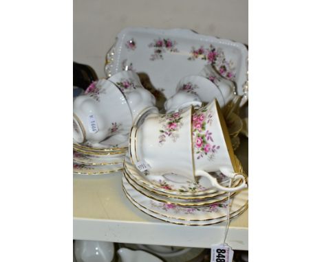 A TWENTY PIECE ROYAL ALBERT LAVENDER ROSE TEA SET, comprising a sandwich plate, six tea cups, seven saucers and six tea plate