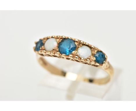 A 9CT GOLD FIVE STONE RING, set with a row of three circular cut blue stones, interspaced with two circular cut opal cabochon