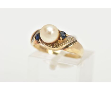 A 9CT GOLD CULTURED PEARL, SAPPHIRE AND DIAMOND RING, centring on a single cultured cream pearl with a pink hue, measuring ap