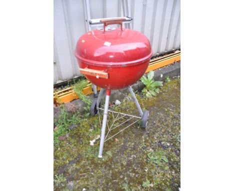 A WEBER DOMED BARBECUE on stand and an aluminium step ladder (2)