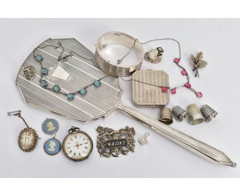 A SELECTION OF SILVER AND WHITE METAL ITEMS, to include a silver vanity mirror decorated with an engine turned design and vac