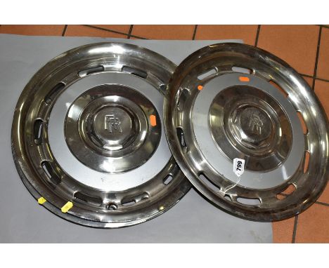 A SET OF FOUR CHROME ROLLS ROYCE HUB CAPS,  diameter 42.5cm, with light grey band and central Rolls Royce interlinked Rs (Con
