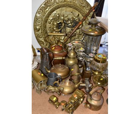 A GROUP OF BRASS AND OTHER METAL WARES, to include a very large brass charger diameter approximately 72cm, a hanging oil lant