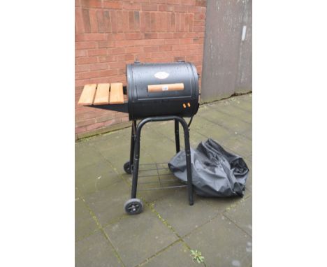 A CHAR-GRILLER PROFESSIONAL METAL BARBECUE in barrel form with side shelf, undershelf and cover, Grill diameter 40cm length 4