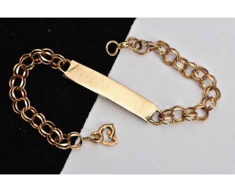 A 9CT GOLD IDENTIFICATION BRACELET, vacant I.D panel hallmarked 9ct London, fitted with a double link bracelet round twist cl
