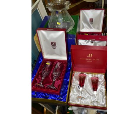 FIVE BOXED SETS OF DRINKING GLASSES AND A BOXED DARTINGTON CRYSTAL 'BOUQUET VASE IN THE FLORABUNDANCE COLLECTION', the drinki