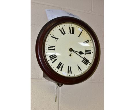 AN EARLY 20TH CENTURY GPO CIRCULAR WALL CLOCK IN A MAHOGANY CASE, painted 29cm dial, Roman numerals, marked GPO to the centre